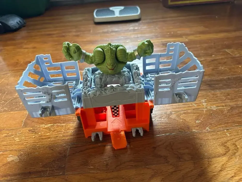 Green Monster Playset Figure with Orange and Gray Play Base